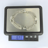 Stainless steel chain bracelet with rectangular fasteners used for embossed wear.