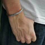 STAINLESS STEEL TWISTED CHAINED BANGLE