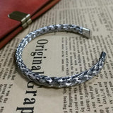 STAINLESS STEEL TWISTED CHAINED BANGLE